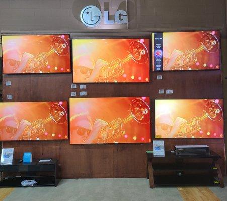 LG TV demo wall featuring the best TVs LG has to offer.