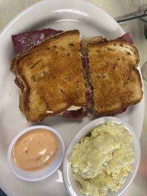 Crispy crunchy Reuben sandwich! Soo good served with potato salad and thousand island.