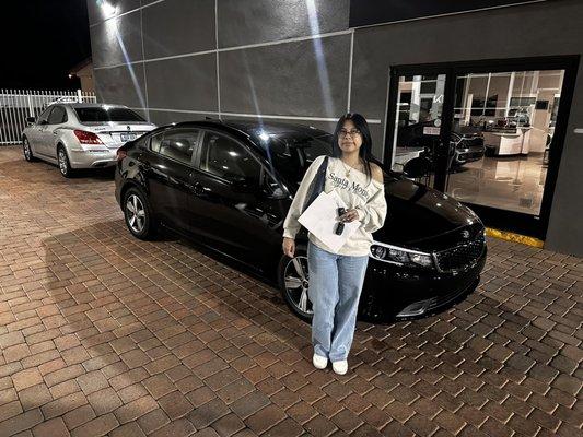 Happy Customer and her new KIA Forte!!