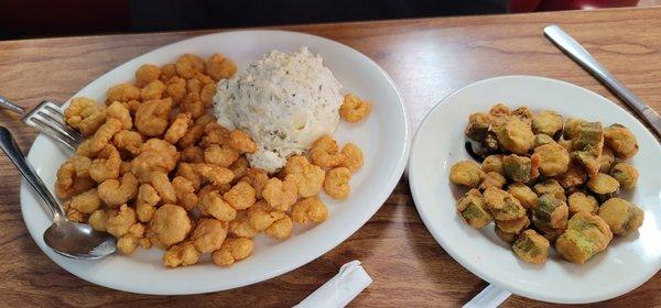 Fried shrimp with coleslaw and fried okra.