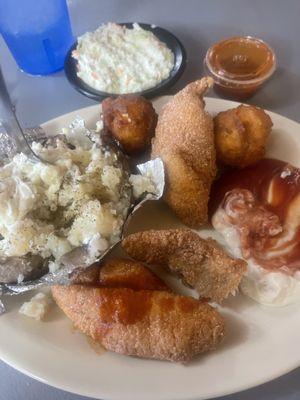 Fish, baked potato, coleslaw and hush puppies!