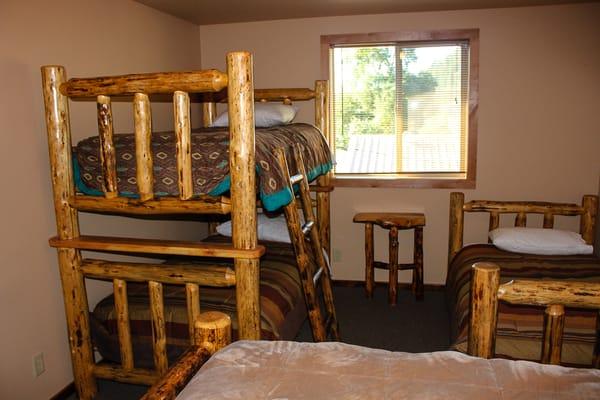 Two bunk beds and queen in upstairs loft