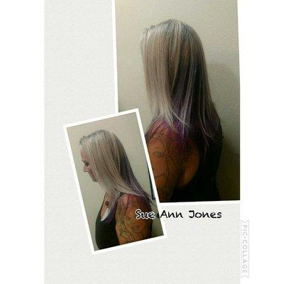 Peekaboo purple, underneath blonde highlighted layered hair. Gorgeous!