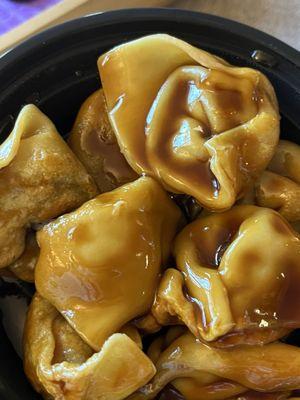 Fried Wontons with Brown Sauce That would bounce if you dropped one