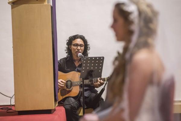 We hired Rodge Mamaung to sing during the ceremony. You can check him out during the Sunday evening mass at St. Rose.