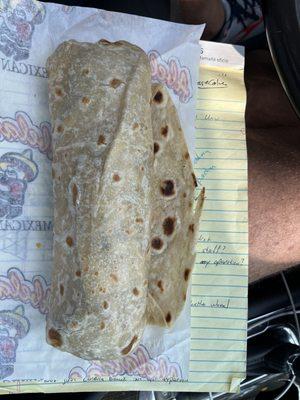 Breakfast burrito: egg cheese and potato. Yes, that's the burrito sitting on a standard legal pad just to show you the size