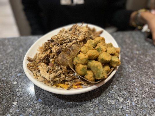 Loaded baked potato with a side of fried okra