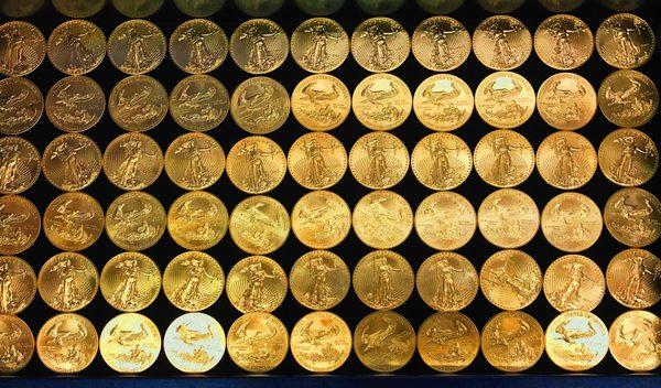 A gorgeous display of some various gold coins.