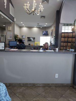 Maskless front of house worker at Legacy animal hospital.