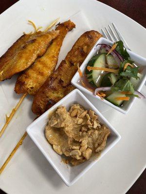 Chicken Satay with peanut sauce and cucumber salad