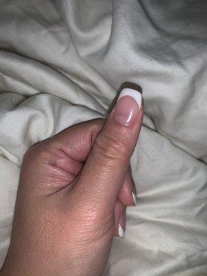 If you zoom you can see the odd shape lump on the white tip on thumb as well as the missing polish on the sides of all the other nails