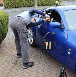 Removing dents from 2011 Nissan Z