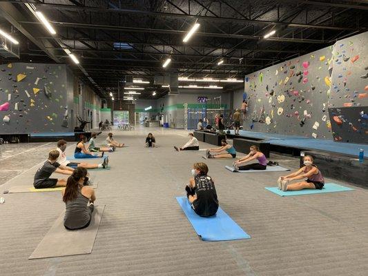 Lots of space at the gym! The climbing team stretches after each session.