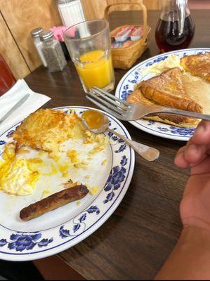 Hash brown over easy eggs sauce link and cinnamon toast crunch