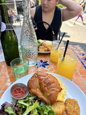 Bacon, egg and cheese croissant with an amazing garlic aioli