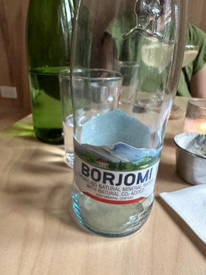 Borjomi mineral water. Salty, effervescent, and very refreshing.