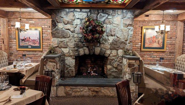 Lovely fireplace in the dining area