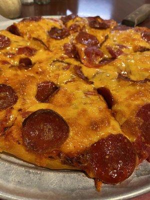 Pizza with cheddar cheese