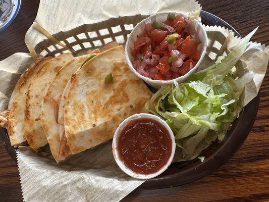 Quesadilla with a side of pico de gallo.