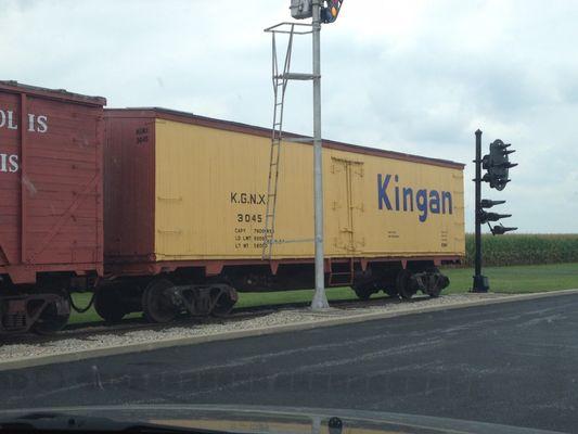 Train cars in front of the restaurant.