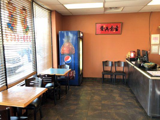 Small Dining Area, Beverage Cooler, To-Go Waiting Area, and Counter