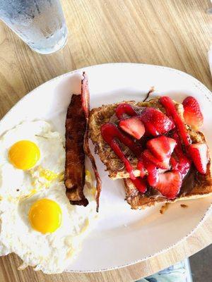 Sunny side up with bacon and brioche French toast