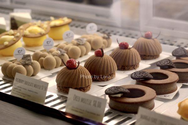 Mousse cakes in display case