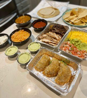 Takeout fajitas and empanadas