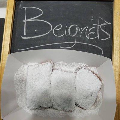 beignets with lots of powdered sugar