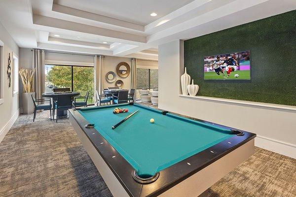 24 hour game room features TVs, billiards table, poker tables and Wall Scrabble