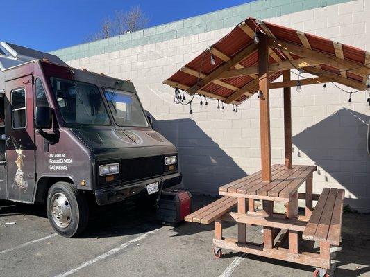 Outdoor dining area at Tacos El Rulas in Berkeley.