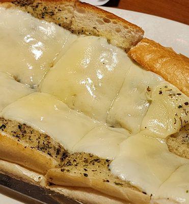 Garlic bread with cheese!  Undercooked for my taste!