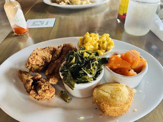 Chicken,collard greens,Mac and cheese and corn bread.