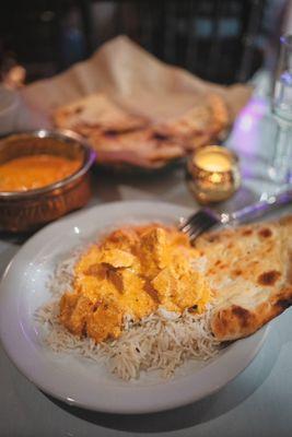 Tikka Masala with chicken and butter naan. Delicious food! Highly recommend.