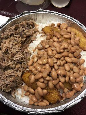 Pernil with rice, beans, y platanos.