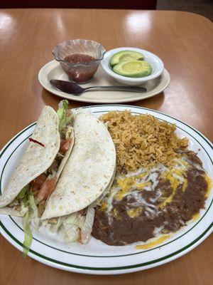 Chicken soft tacos with a side of avocado