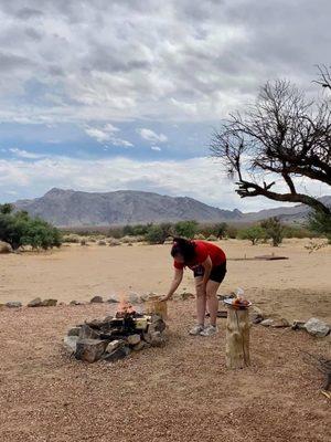 Me roasting a hot dog. I tried to make a small fire but my skill surpassed previous attempts.  (Bring your own wood.)