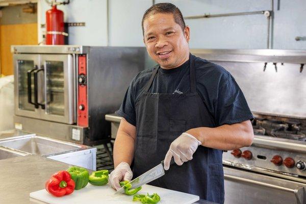 Our friendly chef preparing fresh food for the residents