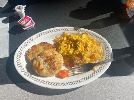 Regular Hashbrowns, 2 Eggs with cheese, and Grilled Biscuit and Jelly