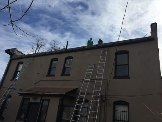 New back gutter installation on a building in Denver CO