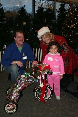 A girl with her new tricycle!