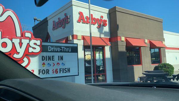 Drive Thru sign and Front Area of Arby's.