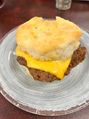 Chicken fried steak biscuit sandwich with cheese