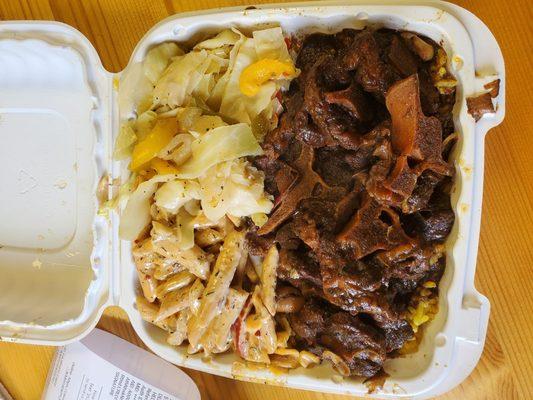 Oxtails, cabbage and rasta pasta