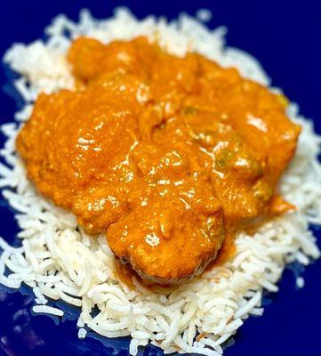 Chicken curry over rice - takeout - chunks of tender boneless chicken in rich curry over fresh n fluffy rice - great!