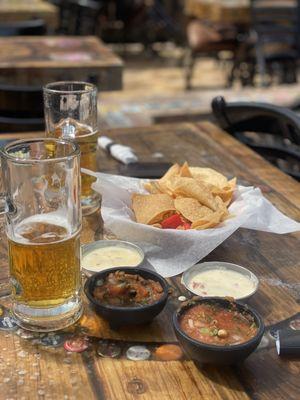 Chips, salsa, queso, Stella beer