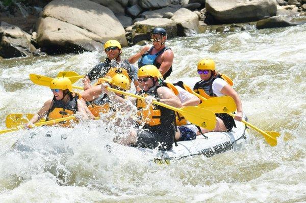 The crew and I cruising dahn the youghigheny river on class III and IV rapids