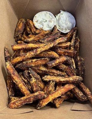 A basket of light and crispy sweet potato fries. The best! Enjoy with a side of garlic herb aioli.