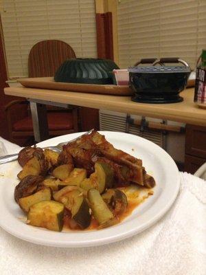 BBQ Ribs stewed zucchini and roasted potatoes