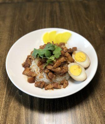 Braised pork belly rice "Lu Rou Fan".  It is served over rice and with a braised egg.